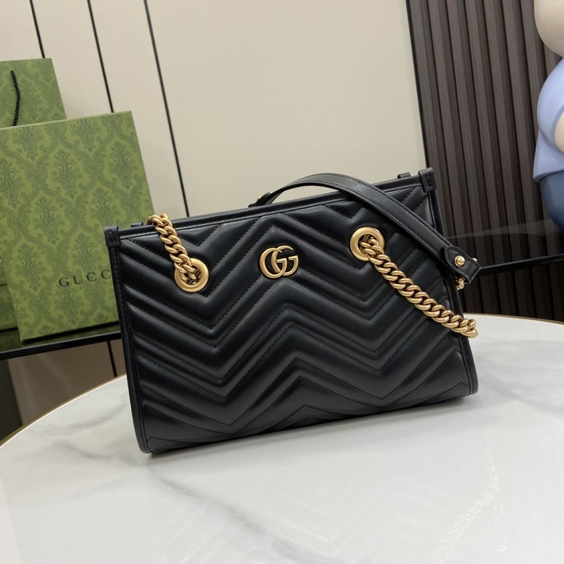 G*u*i shopping bags